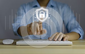 Businessman touch a shield icon with a lock mark. computer data password protection concept internet network security Cyber Ã¢â¬â¹Ã¢â¬â¹